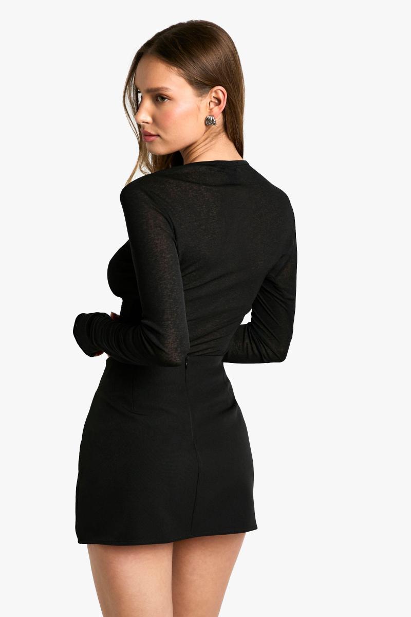 Ткана міні-спідниця з запахом спереду