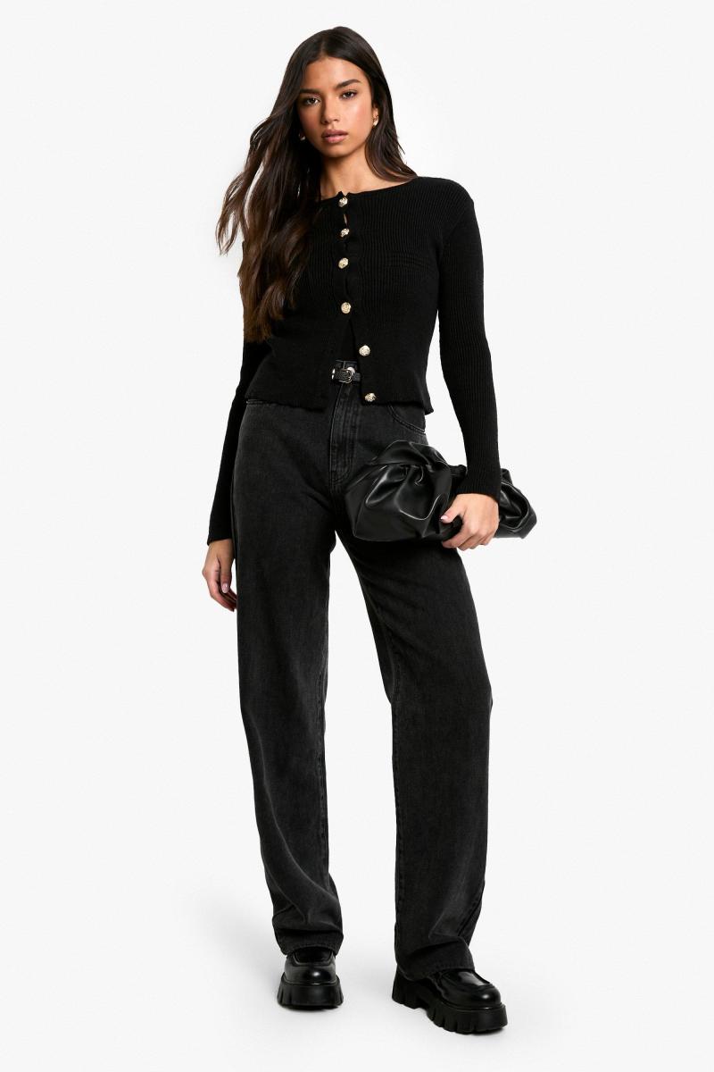 Деталі кнопки в’язаний кардиган