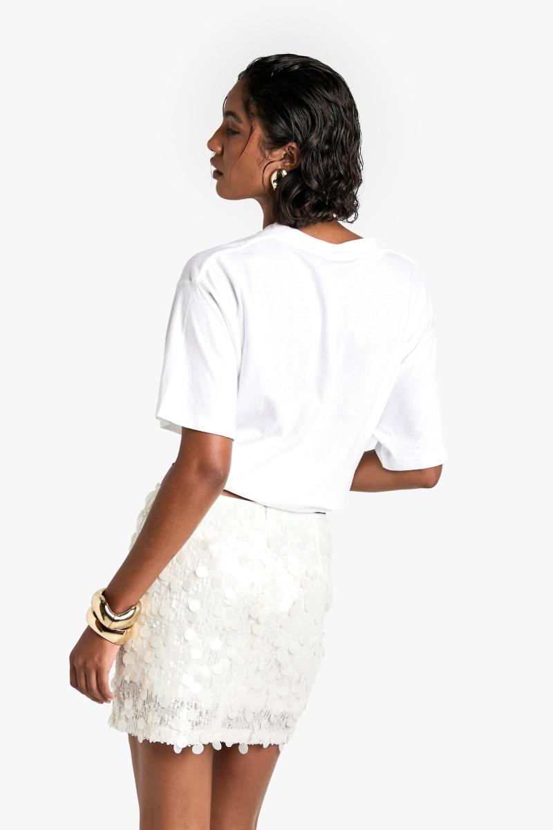 Висока міні-спідниця з паєтками