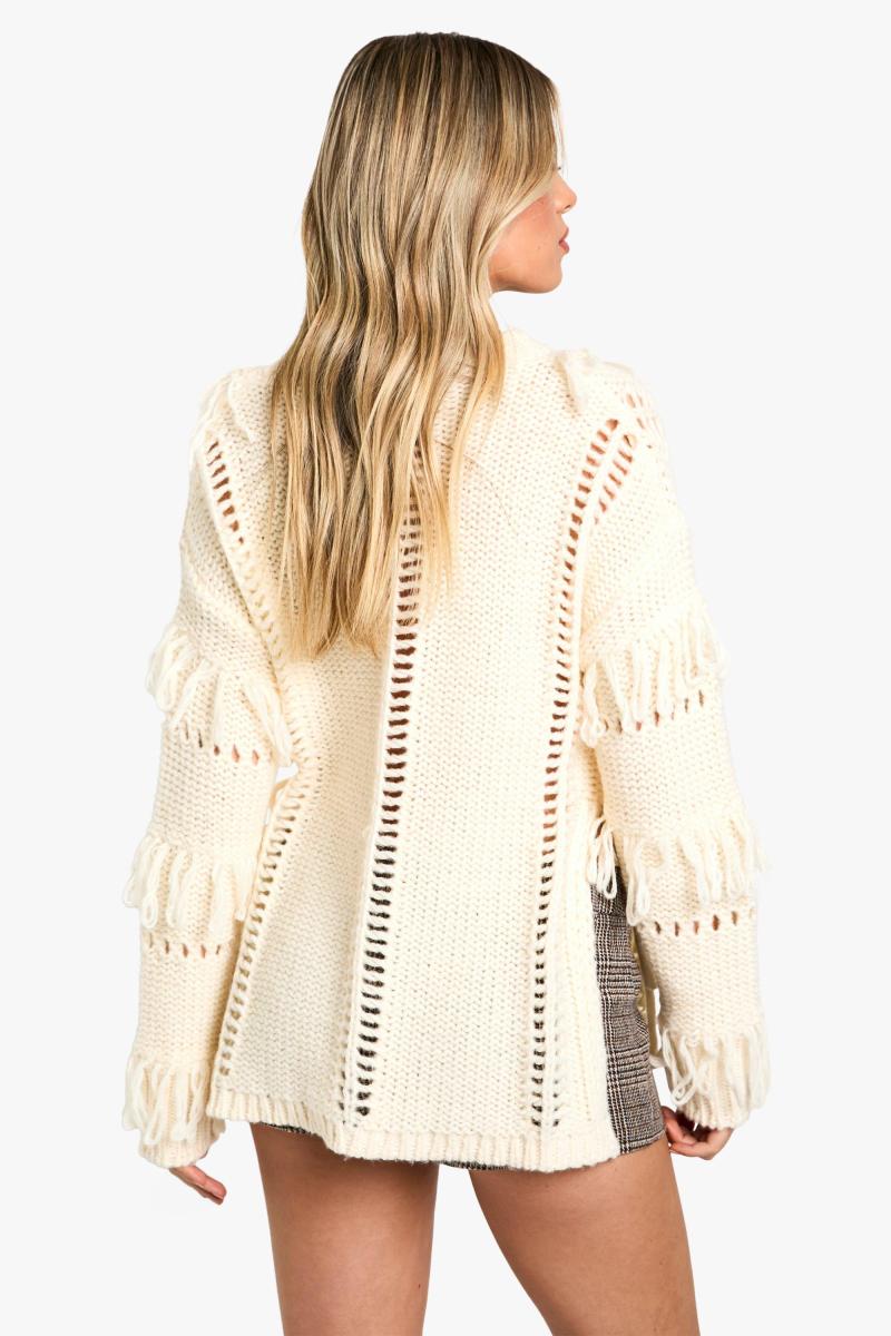 Широкий в'язаний джемпер з бахромою