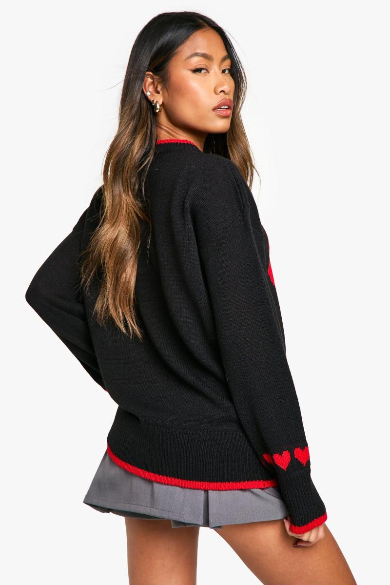 Величезний різдвяний джемпер у формі серця