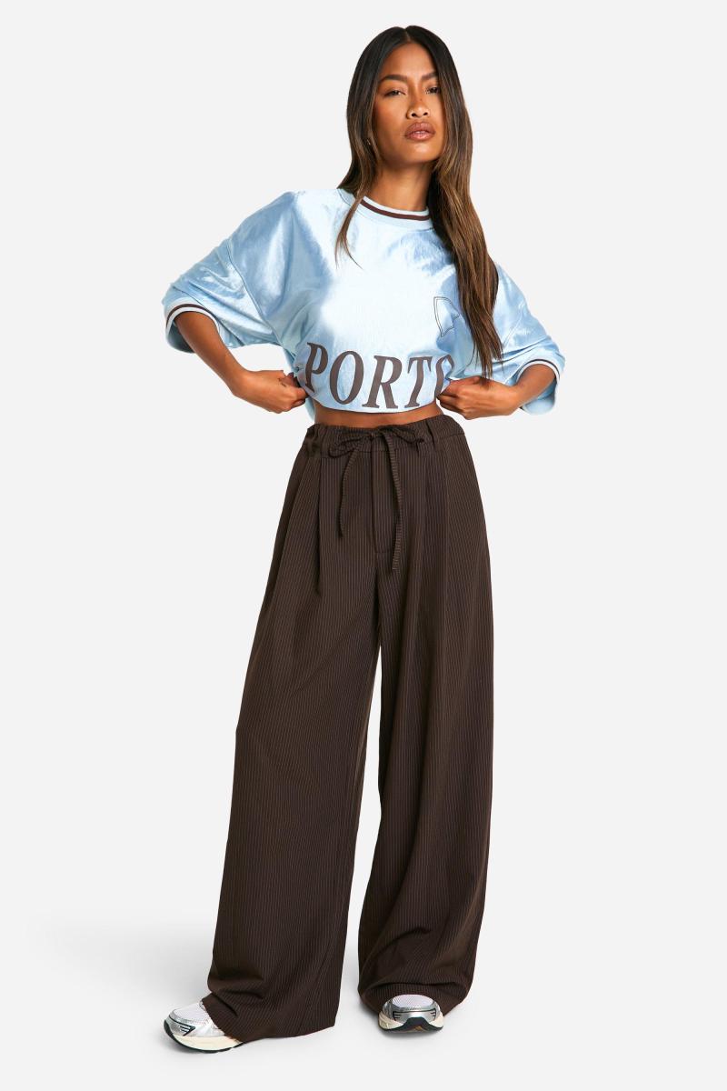 Широкі брюки зі шнурками в тонку смужку