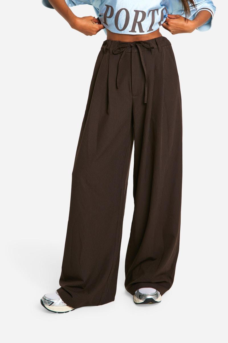 Широкі брюки зі шнурками в тонку смужку