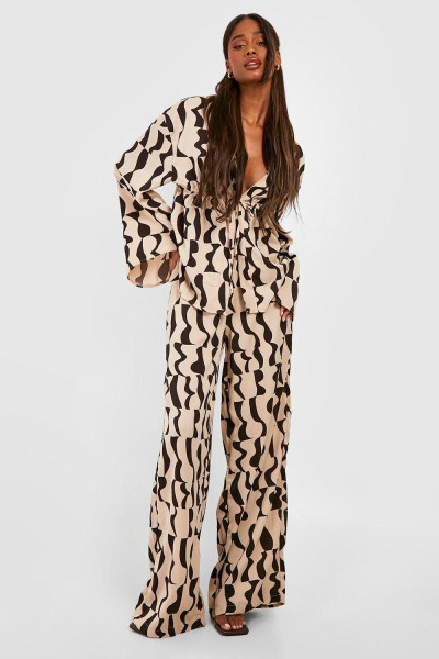 Широкі брюки з абстрактним принтом