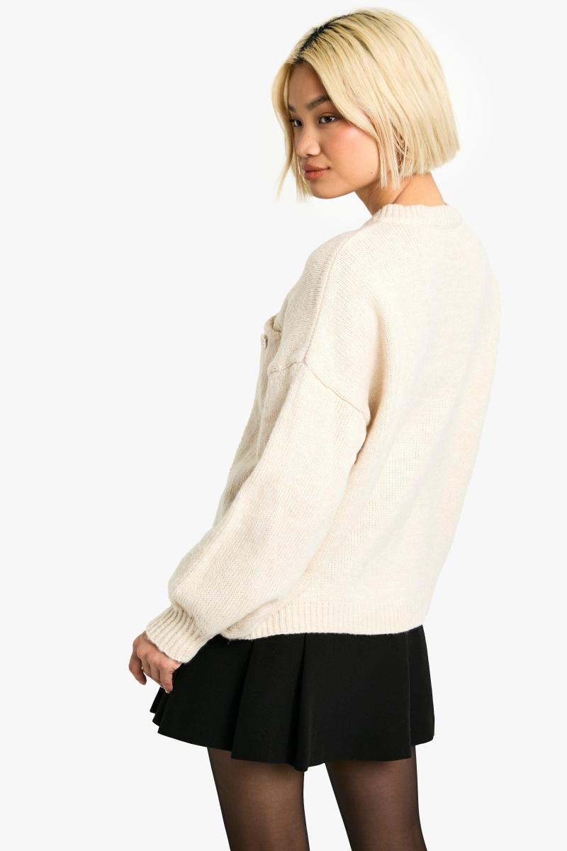 Кучерява в’язана кнопка деталі великого кардигану