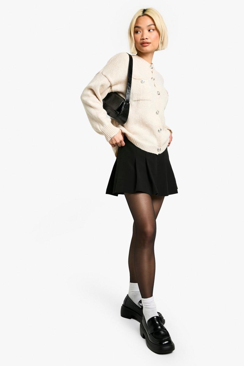 Кучерява в’язана кнопка деталі великого кардигану