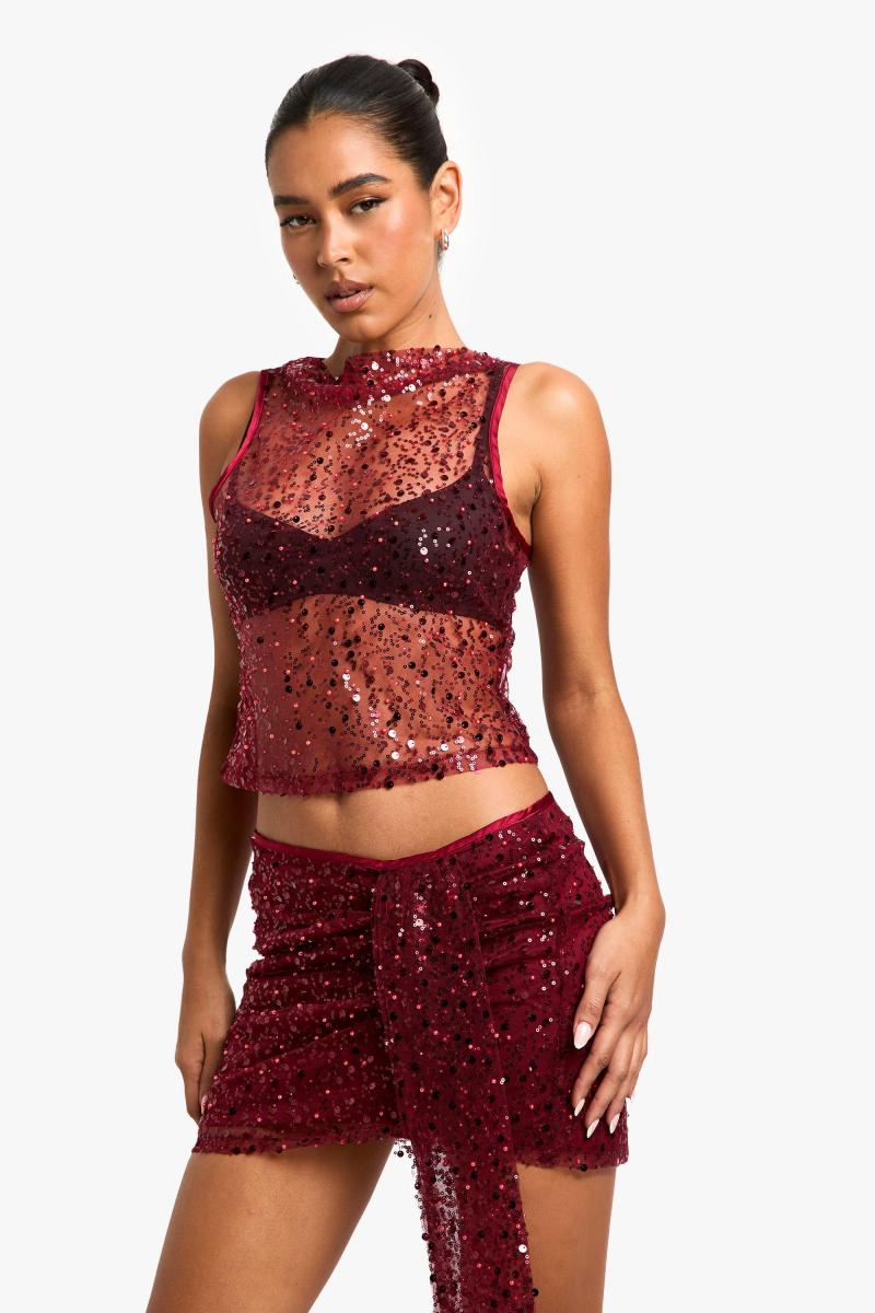 Міні-спідниця з драпіруванням паєтками