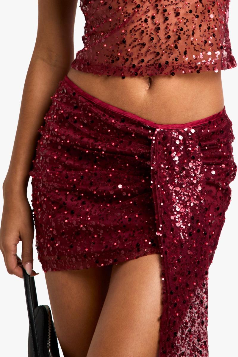 Міні-спідниця з драпіруванням паєтками