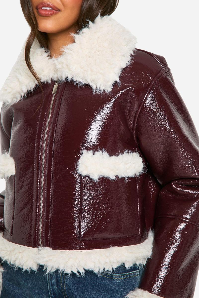 Вінілова куртка зі штучним хутром