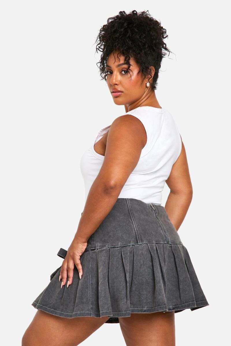 Мікро-міні-спідниця з плісировкою та бантом