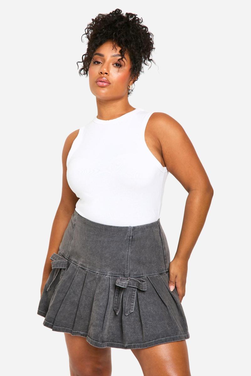 Мікро-міні-спідниця з плісировкою та бантом