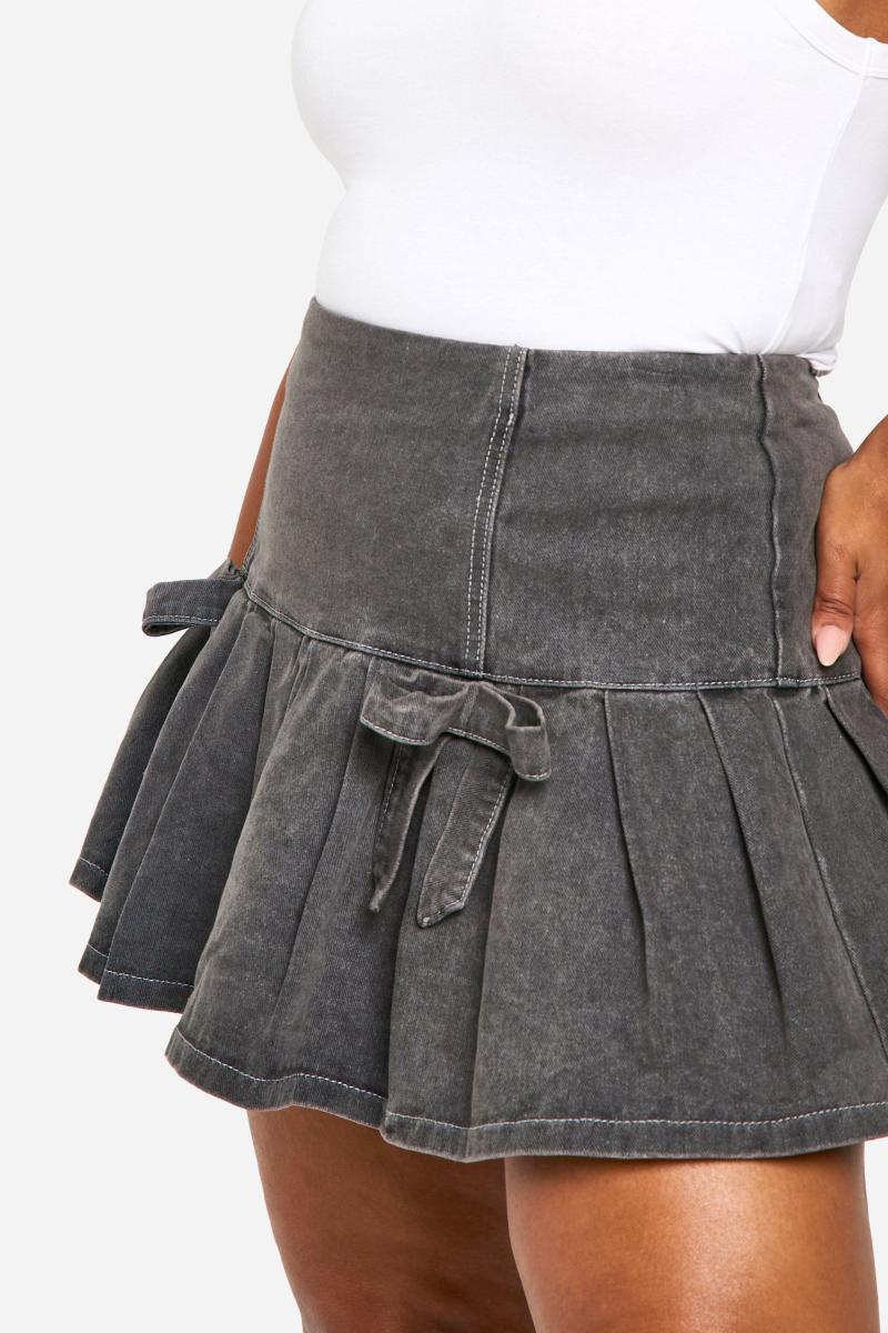 Мікро-міні-спідниця з плісировкою та бантом