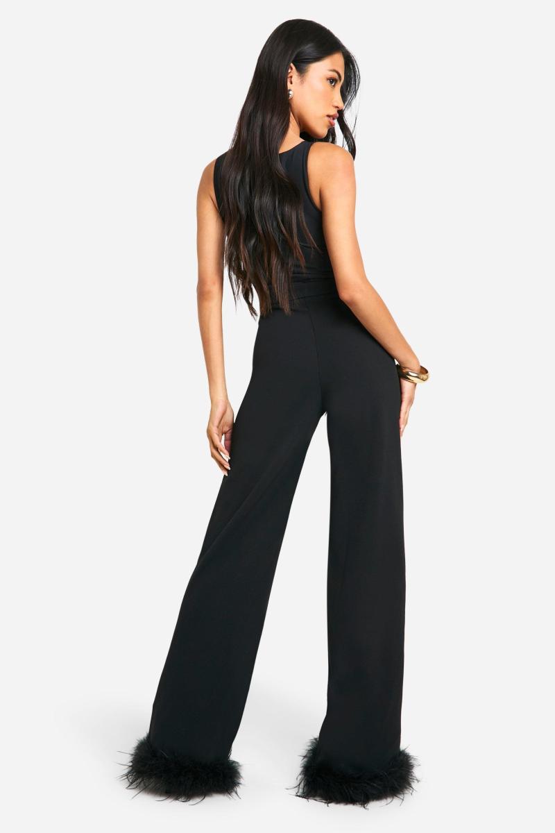 Приталені штани з високою талією з пір’яним подолом