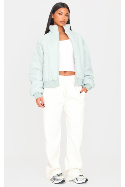 Синій і рожевий двосторонній бомбер-пуховик