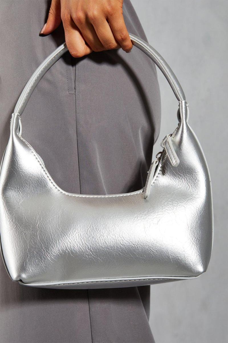 Металева сумочка на подвійній блискавці