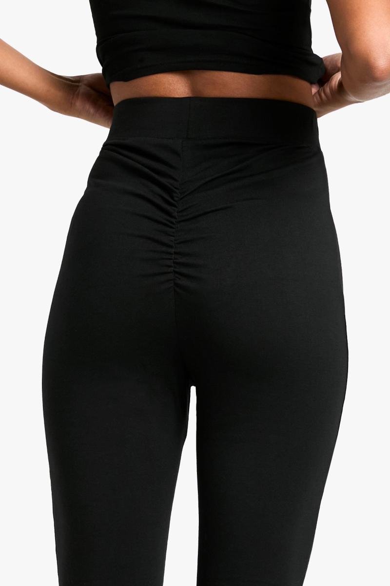 Високий бавовняний трикотаж із рюшами