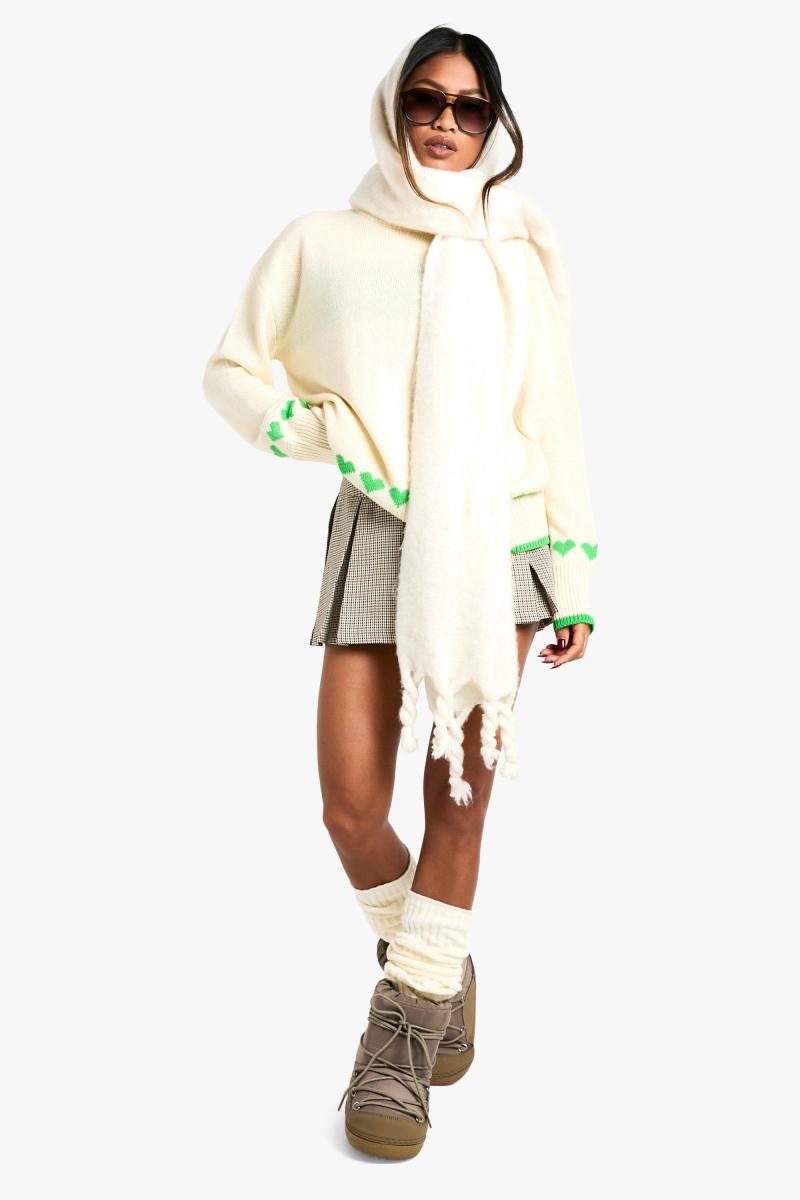 Величезний різдвяний джемпер із сердечками та бантом