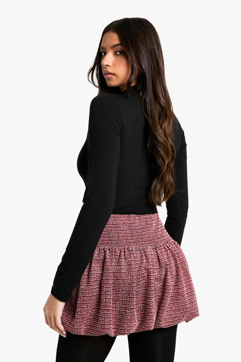 Міні-спідниця з оборками з букле