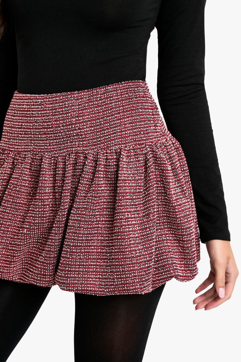 Міні-спідниця з оборками з букле