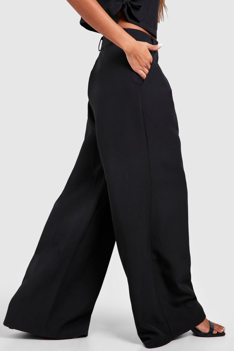 Широкі плісировані штани з високою талією