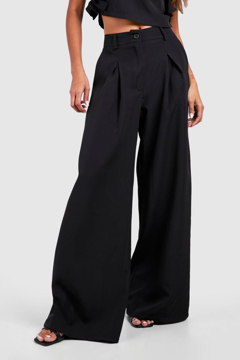 Широкі плісировані штани з високою талією