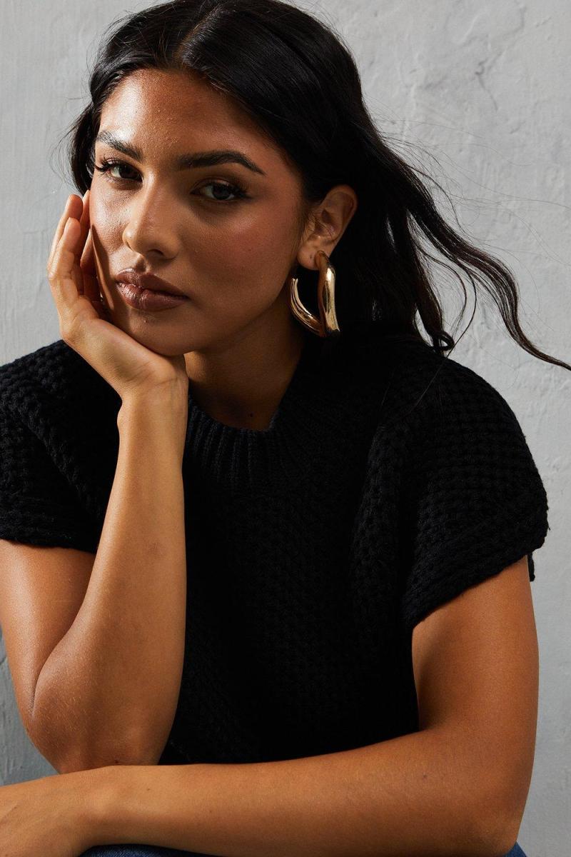 В'язаний шапка, що занурюється на перемичку