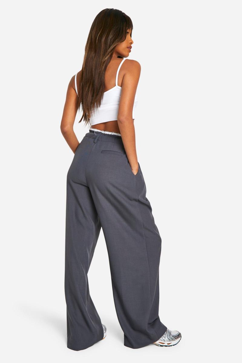 Плетені штани з подвійним поясом і широкими штанинами