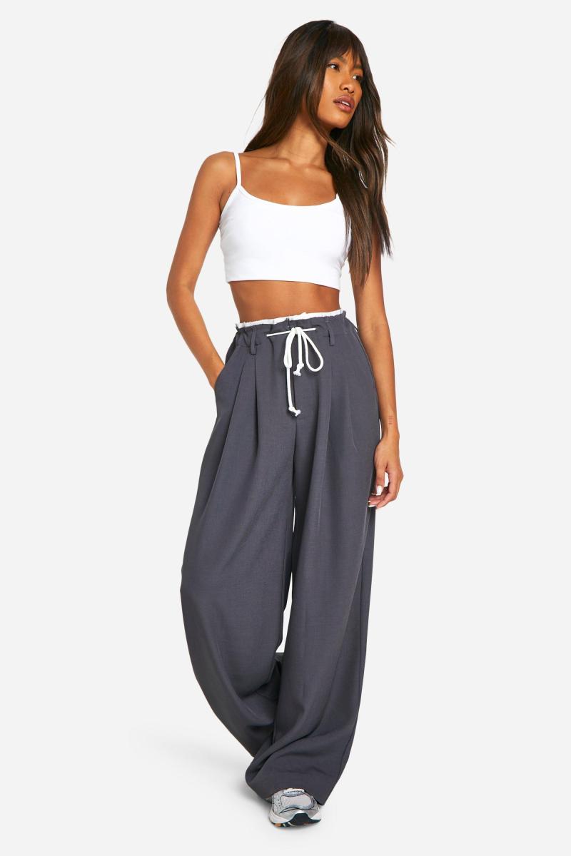 Плетені штани з подвійним поясом і широкими штанинами