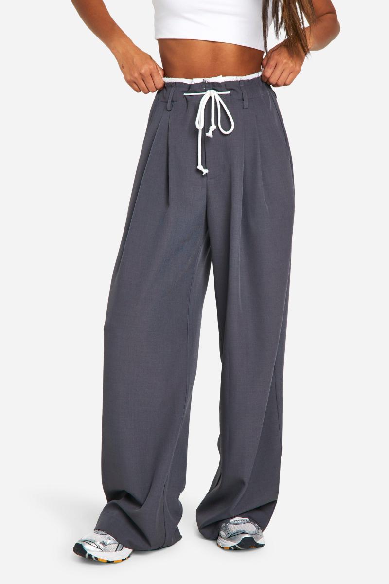 Плетені штани з подвійним поясом і широкими штанинами