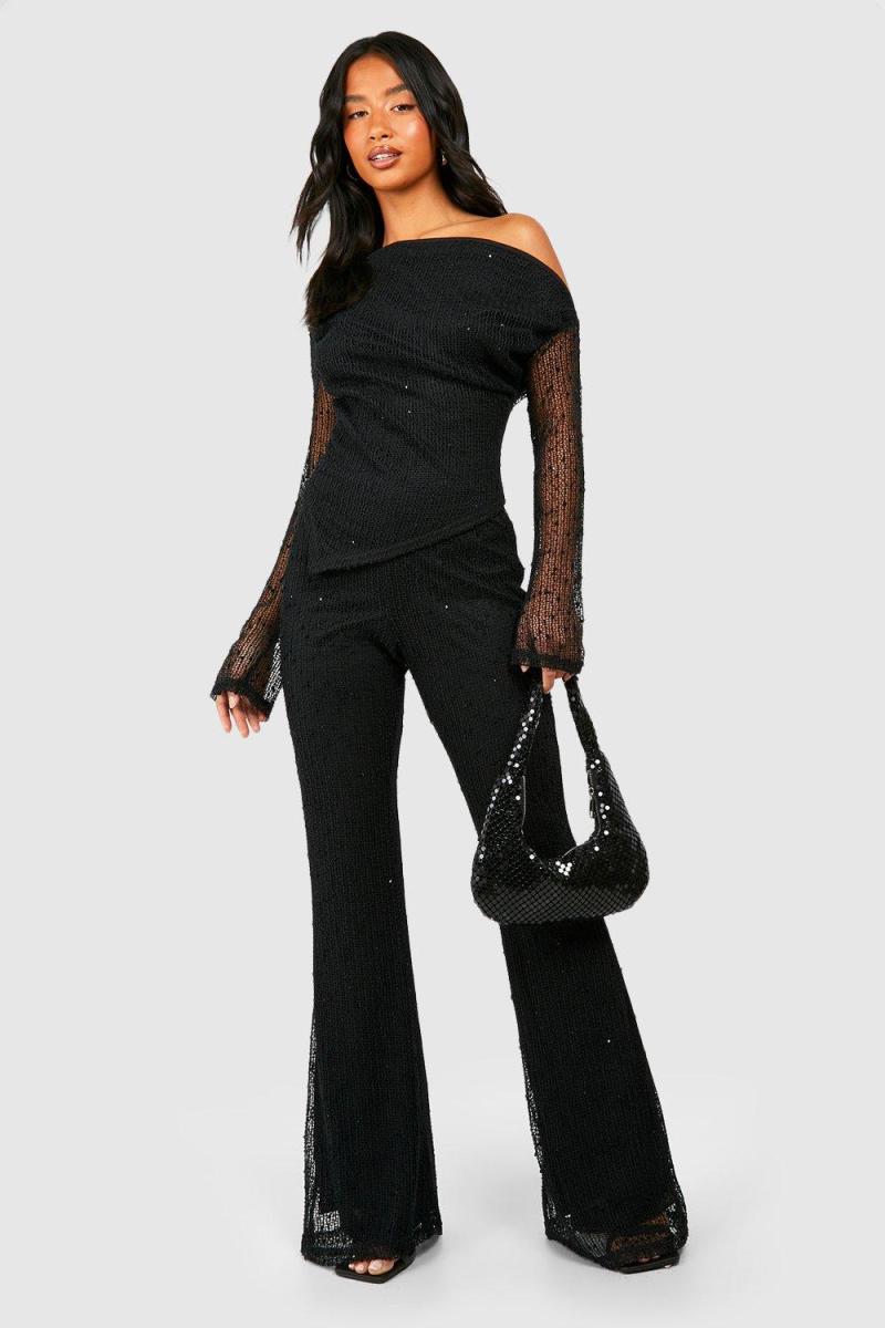 Маленький текстурований в'язаний асиметричний топ з деталями